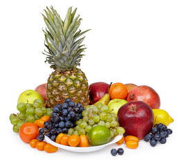 Still life of tropical fruits on white background