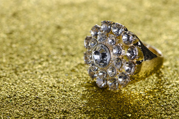 Jewellery ring against shiny background