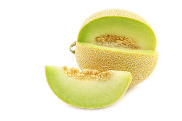 fresh galia melon and a cut piece on a white background