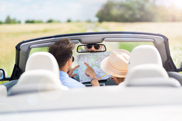 Couple enjoying a drive in a convertible
