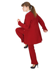 Woman in a dynamic pose on white