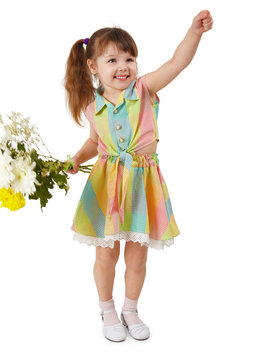 Cheerful child with bouquet of flowers