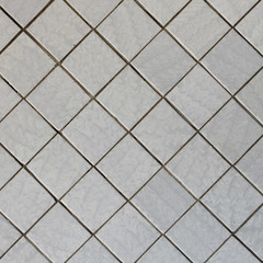Wall covered with tile - diagonal square texture