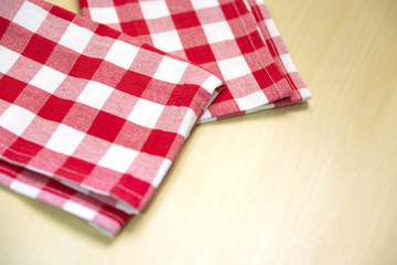 Fototapeta na wymiar Red checkered tablecloth