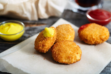 Chicken nuggets on white plate