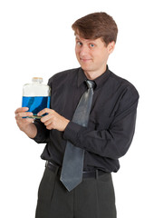 Cheerful man with vial of a blue liquid