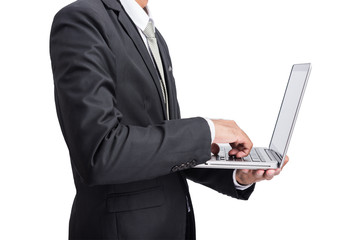 Yong businessman holding laptop