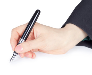 Female hand holds pen