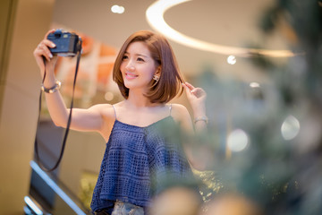 The Travel tourist woman on vacation,And taking pictures from th
