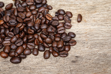 Coffee bean on the wooden floor