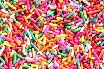colorful sugar sprinkles background.