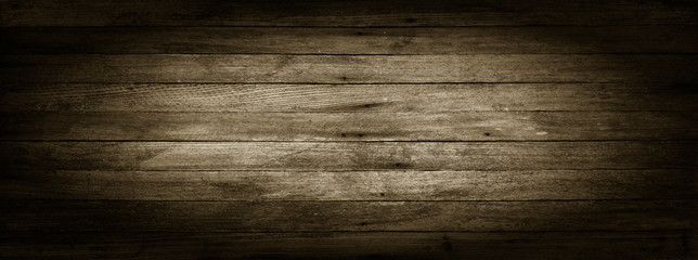 panoramic black and white grunge background of old wooden boards with vignette