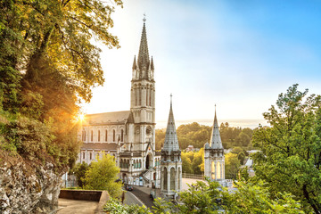 Rosary Basilica on sunset in Lourdes - obrazy, fototapety, plakaty