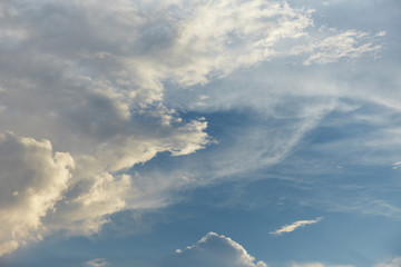 Naklejka na ściany i meble Blue sky is covered by light clouds