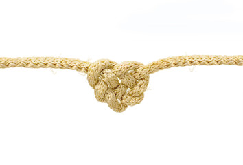 Heart shaped knot on a rope isolated on white background with clipping path