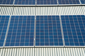 Fototapeta premium Solar panels on a commercial building roof in Sydney, Australia