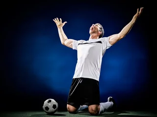 Foto auf Acrylglas soccer player man isolated © snaptitude