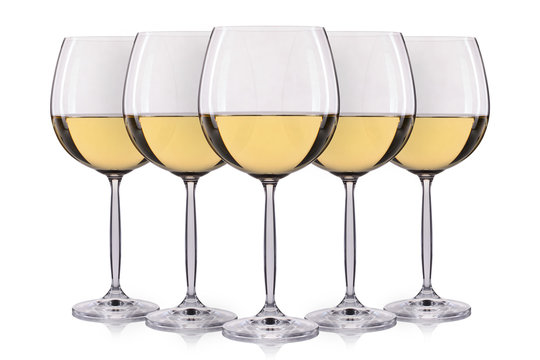 Set of white wine in a glass isolated on white background.