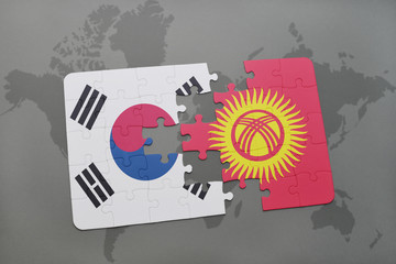 puzzle with the national flag of south korea and kyrgyzstan on a world map background.