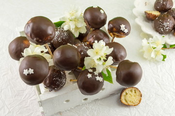 Chocolate cake pops in a wooden box