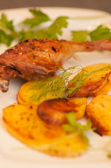 dish of duck with potatoes