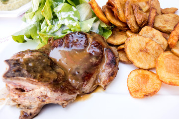 juicy steak beef meat with tomato and potatoes