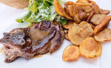 juicy steak beef meat with tomato and potatoes