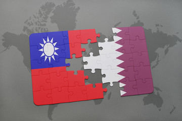 puzzle with the national flag of taiwan and qatar on a world map background.