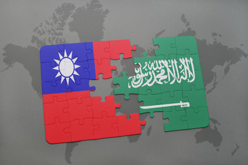 puzzle with the national flag of taiwan and saudi arabia on a world map background.