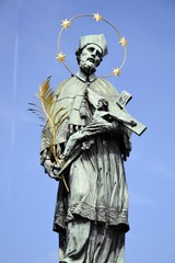 Fototapeta na wymiar St John of Nepomuk and blue sky