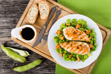 grilled chicken breast served with fried butter beans