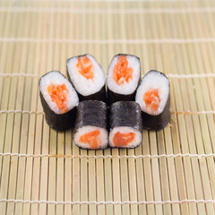 Isolated sushi / rolls.