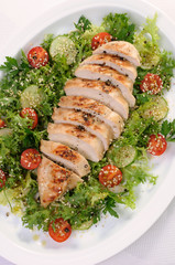 Chicken fillet in a vegetable garnish