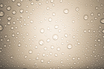 Drops of water on a color background. Gray. Toned
