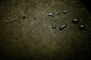 Black old metal background. The surface of the pan. Toned