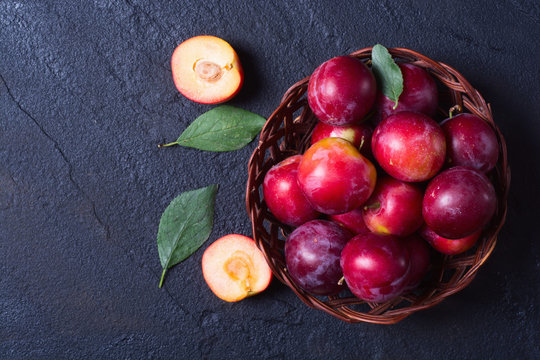 plums in basket