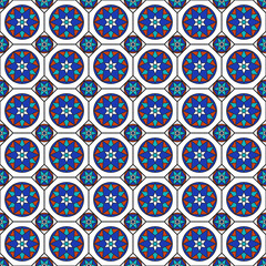 The mosaic pattern of geometric shapes.