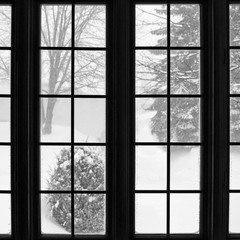 Snowstorm seen through a window