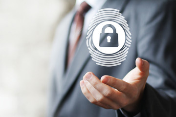 Businessman pressing modern technology panel fingerprint print lock security