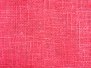 Natural pink fabric weaving as background texture