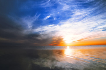 Marine sunset, sun reflected in the water