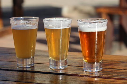 A selection of three craft beers during a tasting session