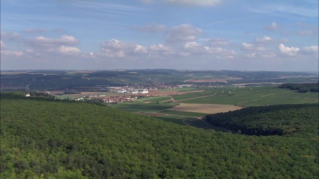 Approaching Chablis Across Vineyards