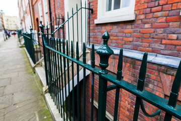 traditional fence in front of city houses in London