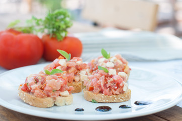 Dakos, Bruschetta  with tomato, greek cheese feta and basil
