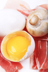 ingredients for breakfast egg bacon mushrooms