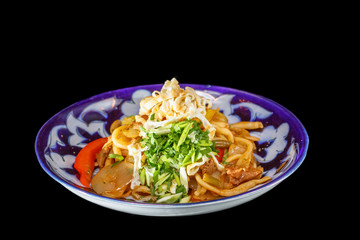 Homemade pasta with vegetables and meat. Central Asian dish.
