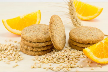 Integral biscuits with orange and wheat seeds