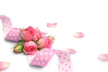 Pink ribbon with flowers. Wedding concept