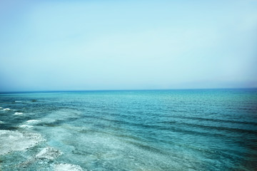 Dead Sea and blue sky as background